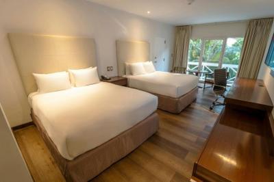 Executive Queen Room with Two Queen Beds, Balcony and Garden View 10