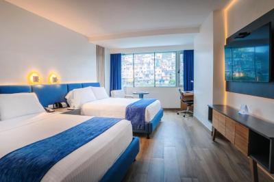Room with Two Double Beds and City View 2