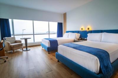 Business Room with Two Double Beds and River View 7