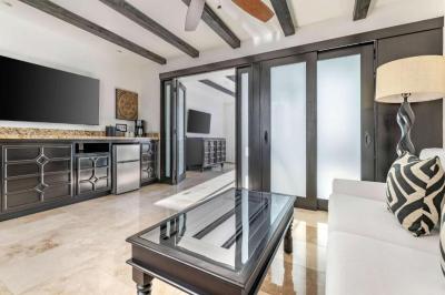 Junior King Suite with Partial Pool View and Balcony 3
