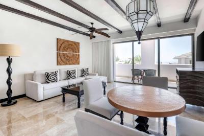 Two Bedroom Suite with Partial Pool View and Balcony 15