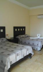 Quarto Duplo com 2 Camas de Casal 1