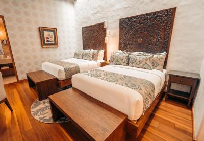 Quarto Premium com 2 Camas de Solteiro 1