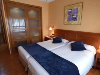 Twin Room with Extra Bed (2 Adults + 1 Child) 2