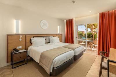 Twin Room with Garden and Pool View 4