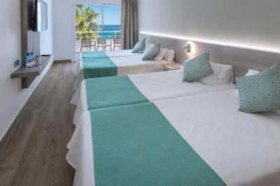 Quarto Qu&aacute;druplo com Vista Mar (2 Adultos + 2 Crian&ccedil;as) 14
